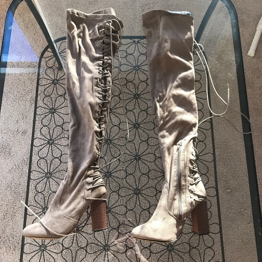 Thigh high lace up boots